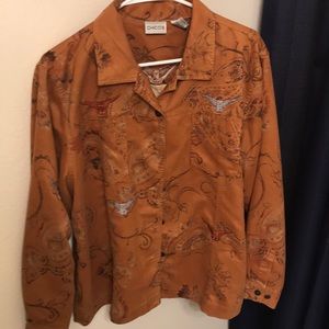 Woman’s suede shirt.